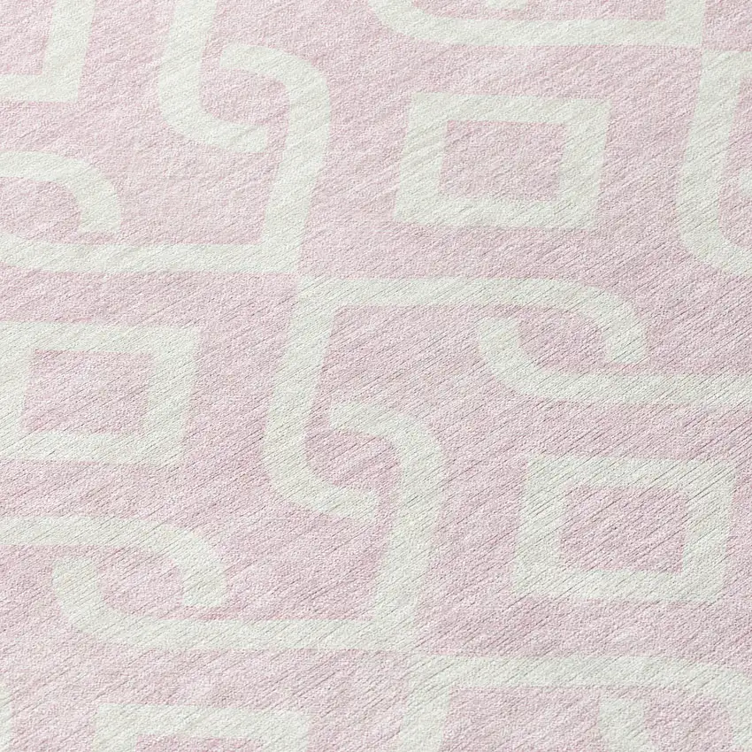 8' Pink And Ivory Round Geometric Washable Indoor Outdoor Area Rug Photo 7