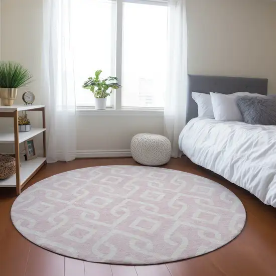 8' Pink And Ivory Round Geometric Washable Indoor Outdoor Area Rug Photo 6