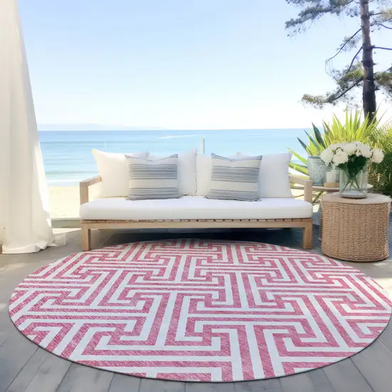 8' Pink And Ivory Round Geometric Washable Indoor Outdoor Area Rug Photo 8