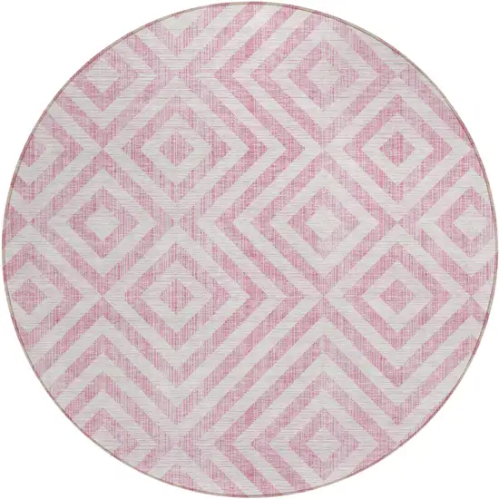 8' Pink And Ivory Round Geometric Washable Indoor Outdoor Area Rug Photo 1