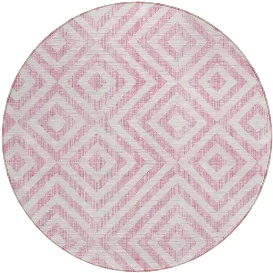 8' Pink And Ivory Round Geometric Washable Indoor Outdoor Area Rug Photo 1