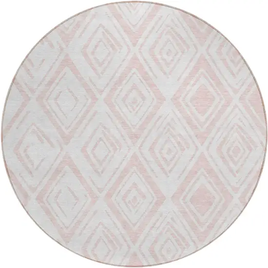 8' Pink And Ivory Round Geometric Washable Indoor Outdoor Area Rug Photo 1