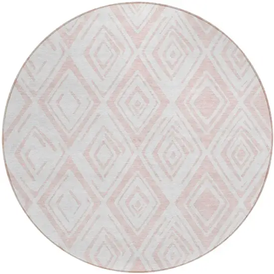 8' Pink And Ivory Round Geometric Washable Indoor Outdoor Area Rug Photo 1