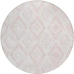 Photo of 8' Pink And Ivory Round Geometric Washable Indoor Outdoor Area Rug