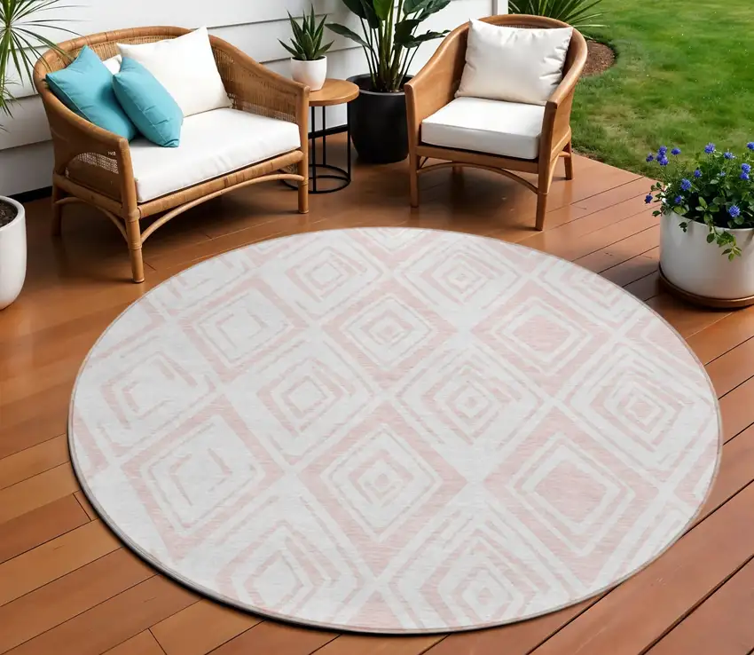8' Pink And Ivory Round Geometric Washable Indoor Outdoor Area Rug Photo 1