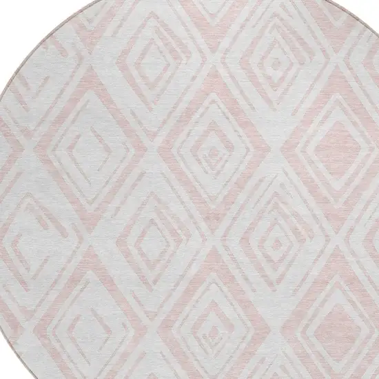 8' Pink And Ivory Round Geometric Washable Indoor Outdoor Area Rug Photo 4