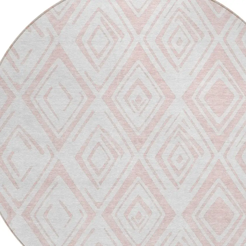 8' Pink And Ivory Round Geometric Washable Indoor Outdoor Area Rug Photo 4