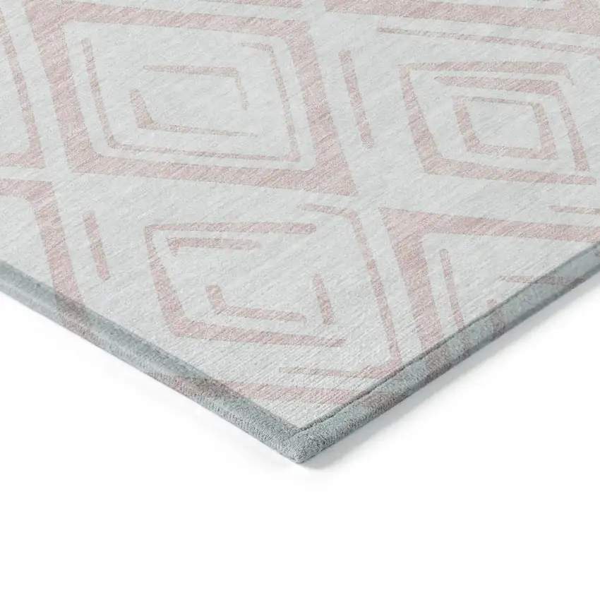 8' Pink And Ivory Round Geometric Washable Indoor Outdoor Area Rug Photo 3