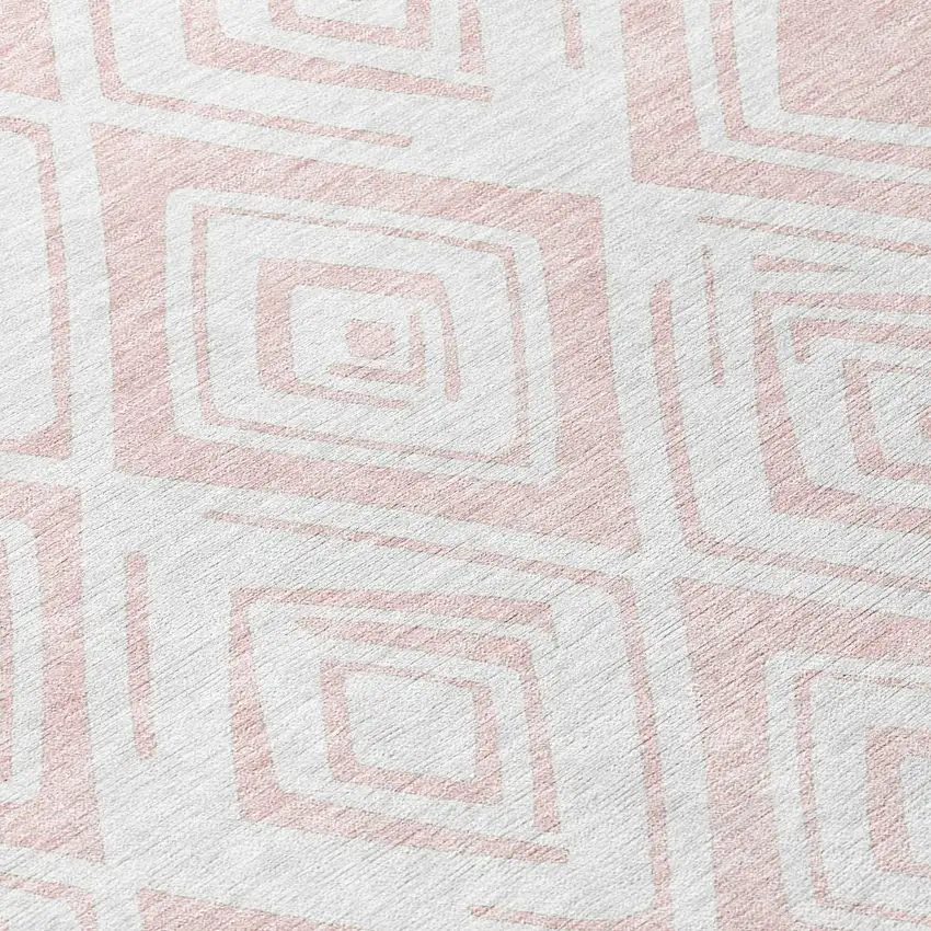 8' Pink And Ivory Round Geometric Washable Indoor Outdoor Area Rug Photo 5
