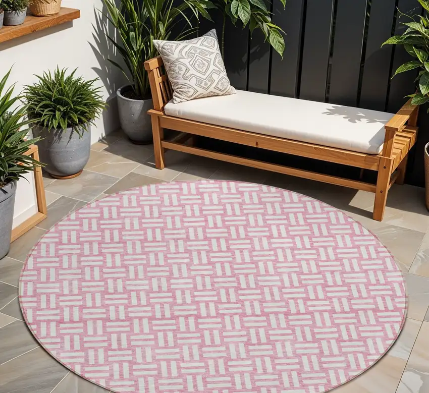 8' Pink And Ivory Round Geometric Washable Indoor Outdoor Area Rug Photo 1
