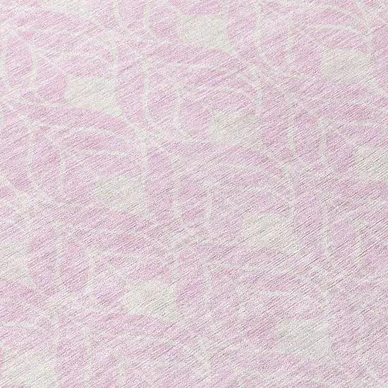8' Pink And Ivory Round Geometric Washable Indoor Outdoor Area Rug Photo 7