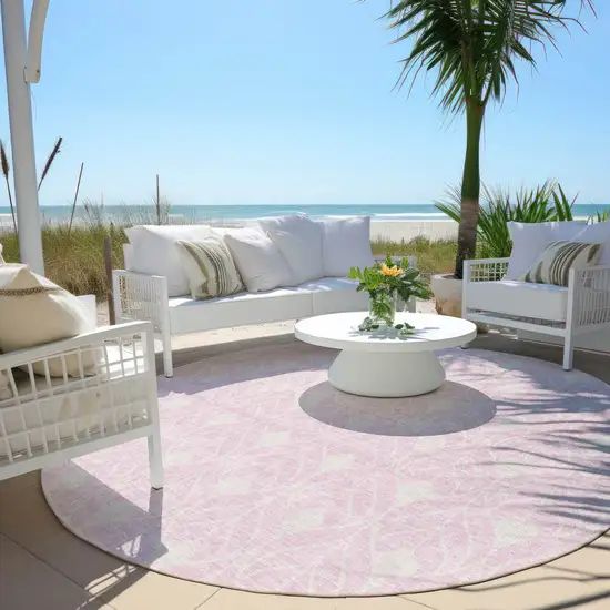 8' Pink And Ivory Round Geometric Washable Indoor Outdoor Area Rug Photo 5