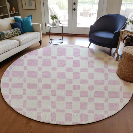 8' Pink And Ivory Round Geometric Washable Indoor Outdoor Area Rug Photo 7