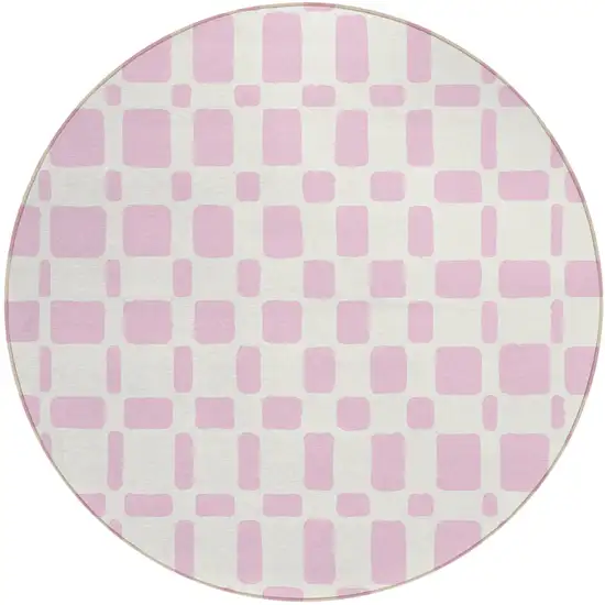 8' Pink And Ivory Round Geometric Washable Indoor Outdoor Area Rug Photo 2