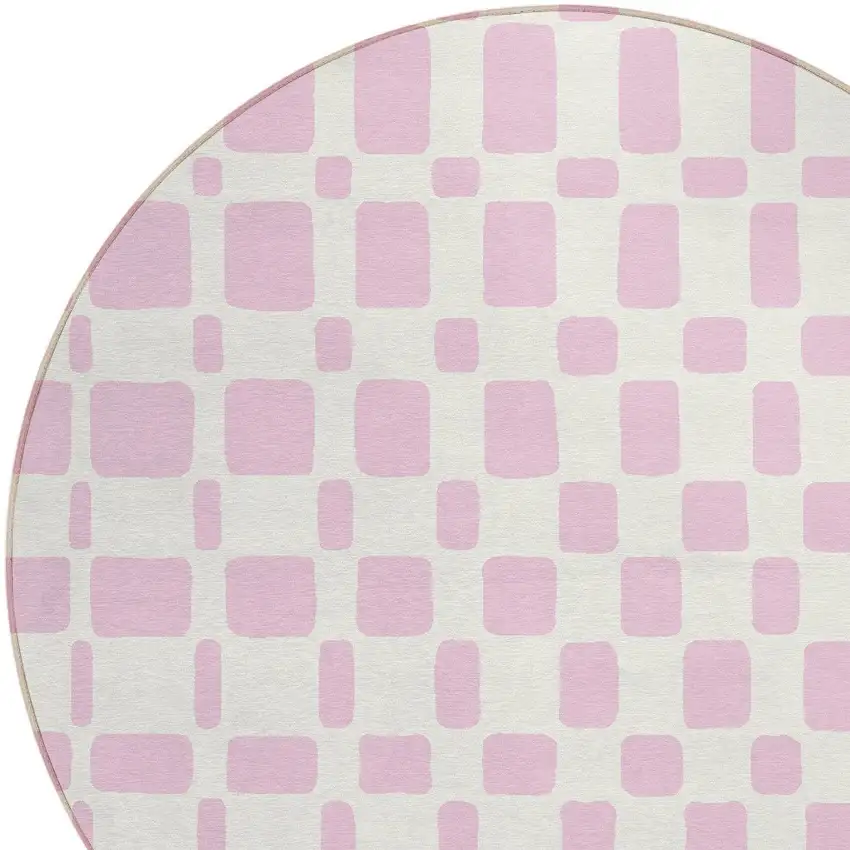 8' Pink And Ivory Round Geometric Washable Indoor Outdoor Area Rug Photo 4
