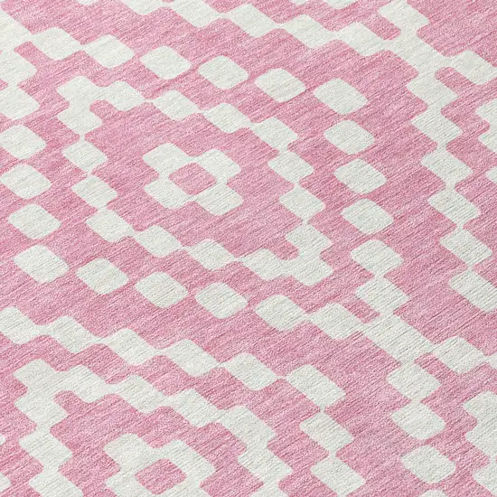 8' Pink And Ivory Round Geometric Washable Indoor Outdoor Area Rug Photo 4