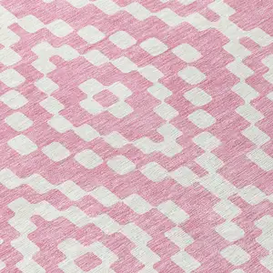 Photo of 8' Pink And Ivory Round Geometric Washable Indoor Outdoor Area Rug