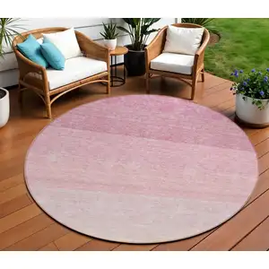 Photo of 8' Pink And Ivory Round Ombre Washable Indoor Outdoor Area Rug