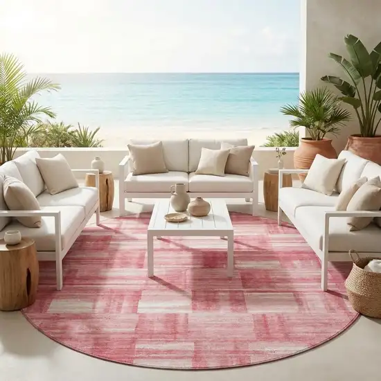 8' Pink And Ivory Round Striped Washable Indoor Outdoor Area Rug Photo 1