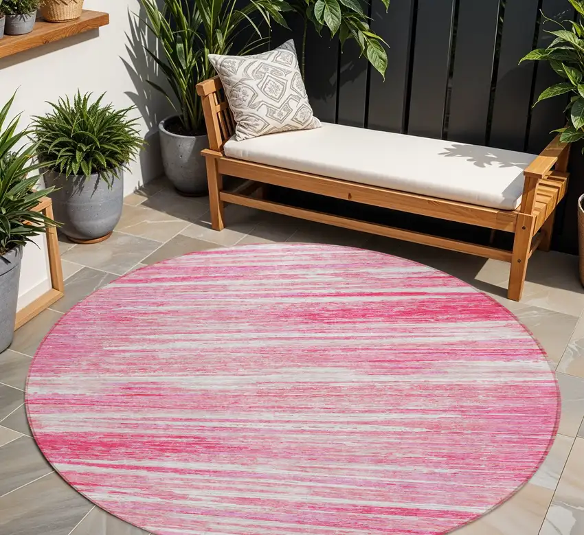 8' Pink And Ivory Round Striped Washable Indoor Outdoor Area Rug Photo 1