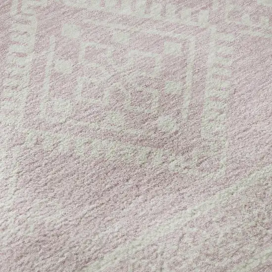 8' Pink And Ivory Southwestern Washable Round Rug With UV Protection Photo 9