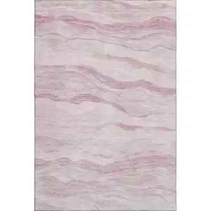 Photo of 8' Pink And Ivory Striped Washable Area Rug With UV Protection