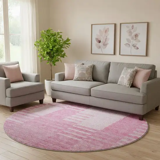 8' Pink And Ivory Striped Washable Round Rug With UV Protection Photo 1