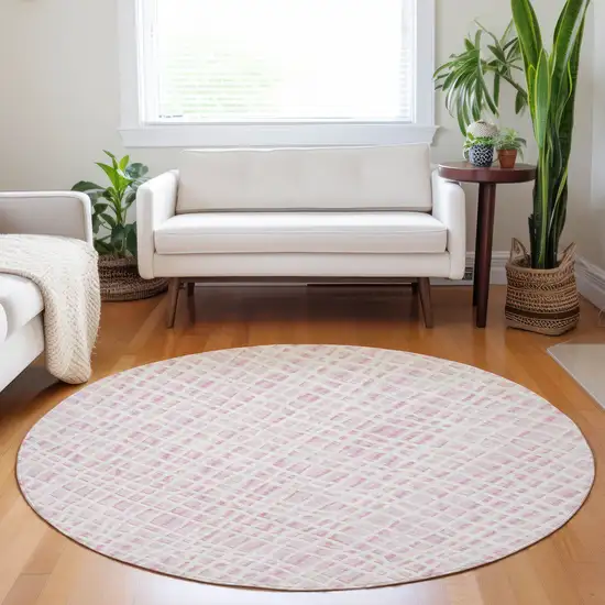8' Pink And Ivory Striped Washable Round Rug With UV Protection Photo 5
