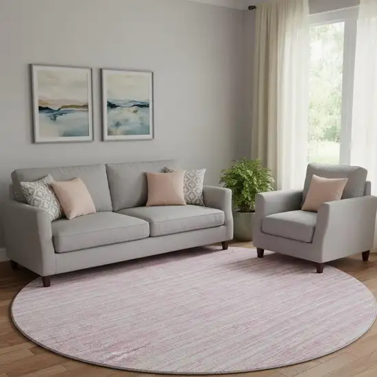 8' Pink And Ivory Striped Washable Round Rug With UV Protection Photo 1