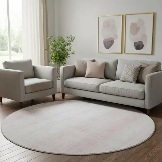 8' Pink And Ivory Striped Washable Round Rug With UV Protection Photo 1