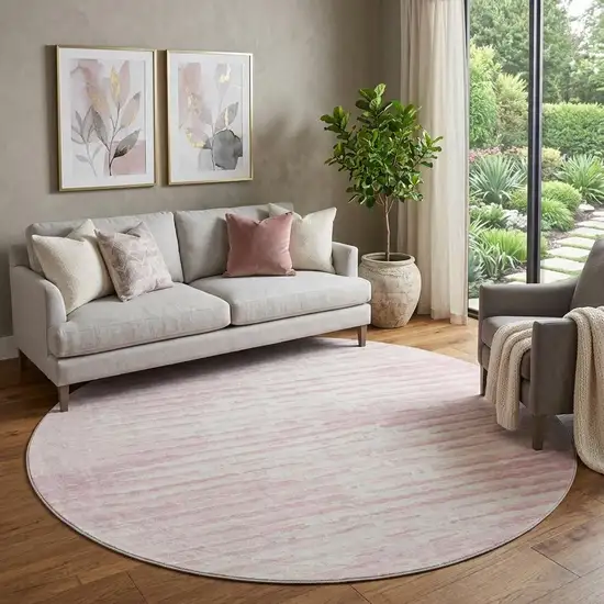 8' Pink And Ivory Striped Washable Round Rug With UV Protection Photo 1