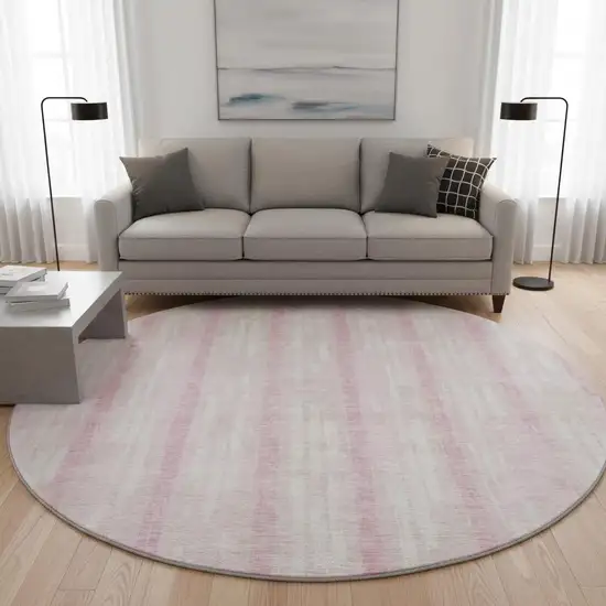 8' Pink And Ivory Striped Washable Round Rug With UV Protection Photo 2