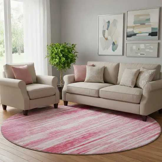 8' Pink And Ivory Striped Washable Round Rug With UV Protection Photo 1