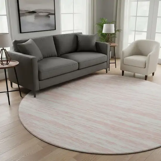 8' Pink And Ivory Striped Washable Round Rug With UV Protection Photo 2
