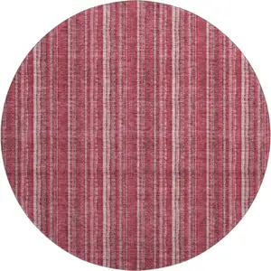 Photo of 8' Pink And Ivory Striped Washable Round Rug With UV Protection
