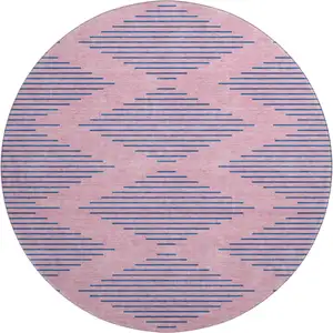 Photo of 8' Pink And Navy Blue Geometric Washable Round Rug With UV Protection