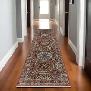 Photo of 8' Pink And Red Medallion Runner Rug With Fringe