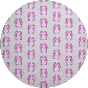 Photo of 8' Pink And Silver Geometric Washable Round Rug With UV Protection