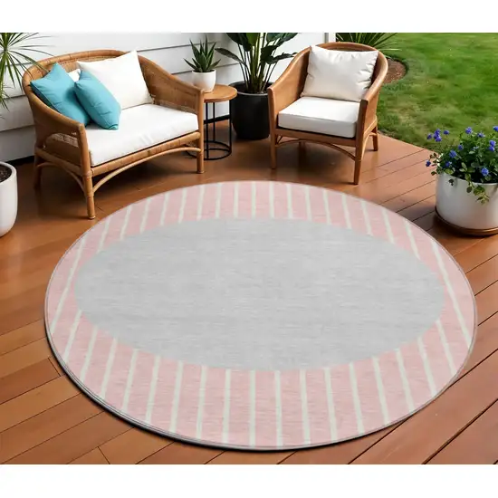 8' Pink And Silver Round Striped Washable Indoor Outdoor Area Rug Photo 1