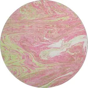 Photo of 8' Pink Artichoke Green And Ivory Abstract Washable Round Rug With UV Protection