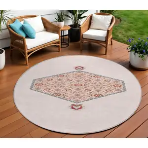 Photo of 8' Pink Beige And Burgundy Round Oriental Washable Indoor Outdoor Area Rug