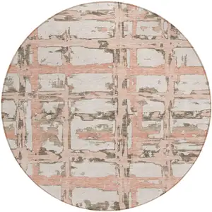 Photo of 8' Pink Beige And Taupe Round Striped Washable Indoor Outdoor Area Rug