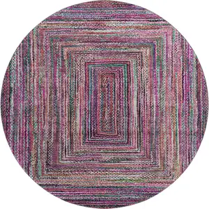 Photo of 8' Pink Blue And Orange Geometric Washable Round Rug With UV Protection