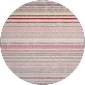 Photo of 8' Pink Burgundy And Ivory Striped Washable Round Rug With UV Protection