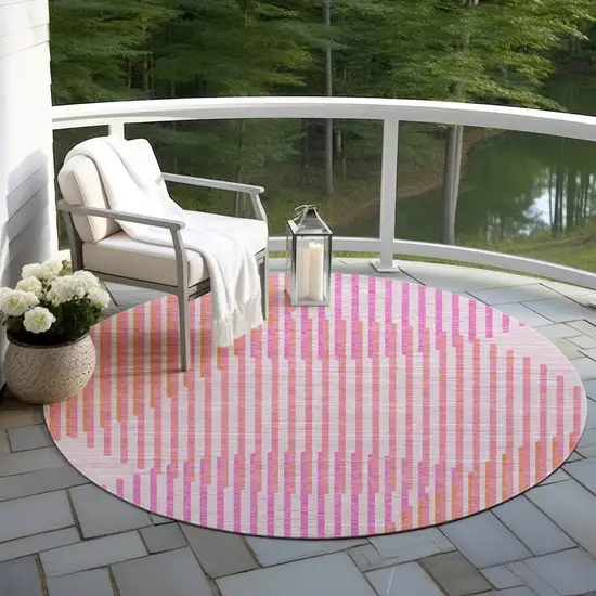 8' Pink Copper And Ivory Round Geometric Washable Indoor Outdoor Area Rug Photo 7