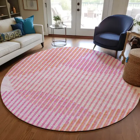 8' Pink Copper And Ivory Round Geometric Washable Indoor Outdoor Area Rug Photo 8