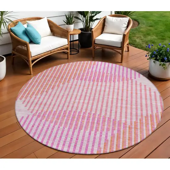 8' Pink Copper And Ivory Round Geometric Washable Indoor Outdoor Area Rug Photo 1