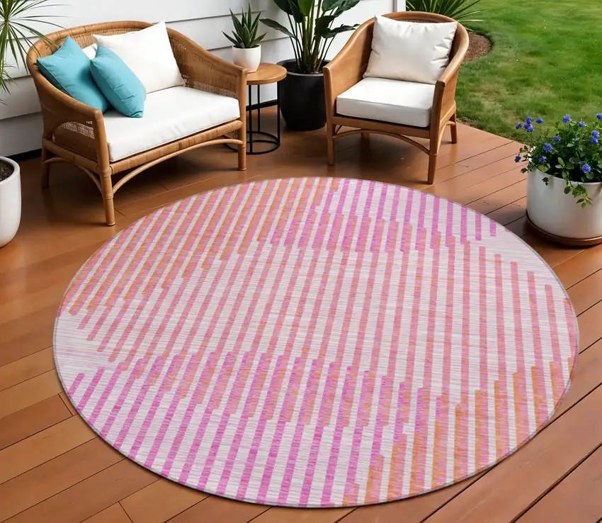 8' Pink Copper And Ivory Round Geometric Washable Indoor Outdoor Area Rug Photo 1