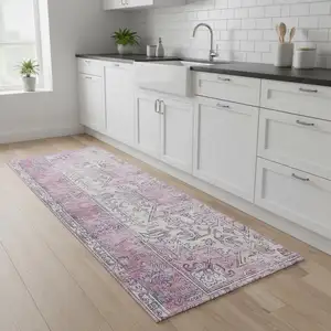 Photo of 8' Pink Floral Power Loom Worn Faded Non Skid Runner Rug