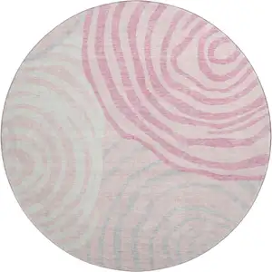 Photo of 8' Pink Gray And Ivory Abstract Washable Round Rug With UV Protection